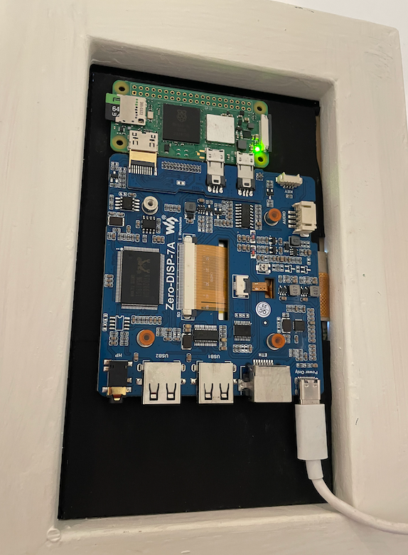Back of Touchscreen showing Raspberry Pi and USB-C power